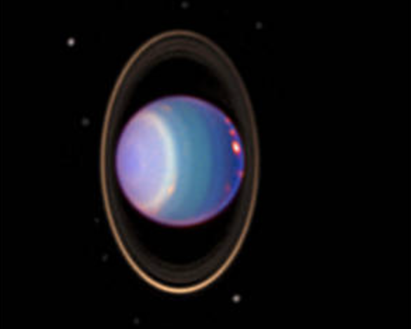 Uranus is surrounded by its four major rings and 10 of its 27 known moons in this color-added view that uses data taken by the Hubble Space Telescope in 1998. A study featuring new modeling shows that four of Uranus’ large moons likely contain internal oceans. Credits: NASA/JPL/STScI